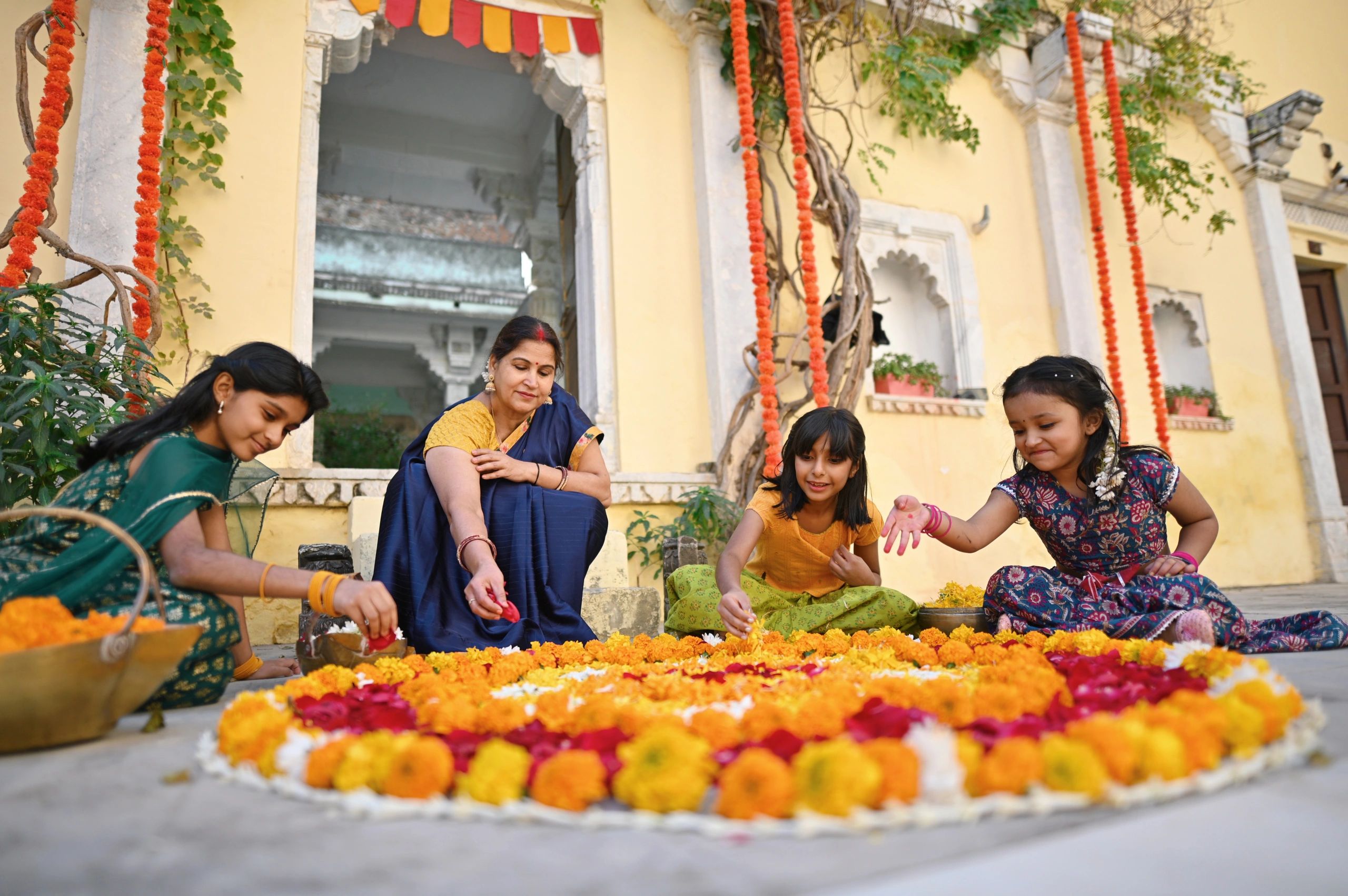 Community members creating a floral display together