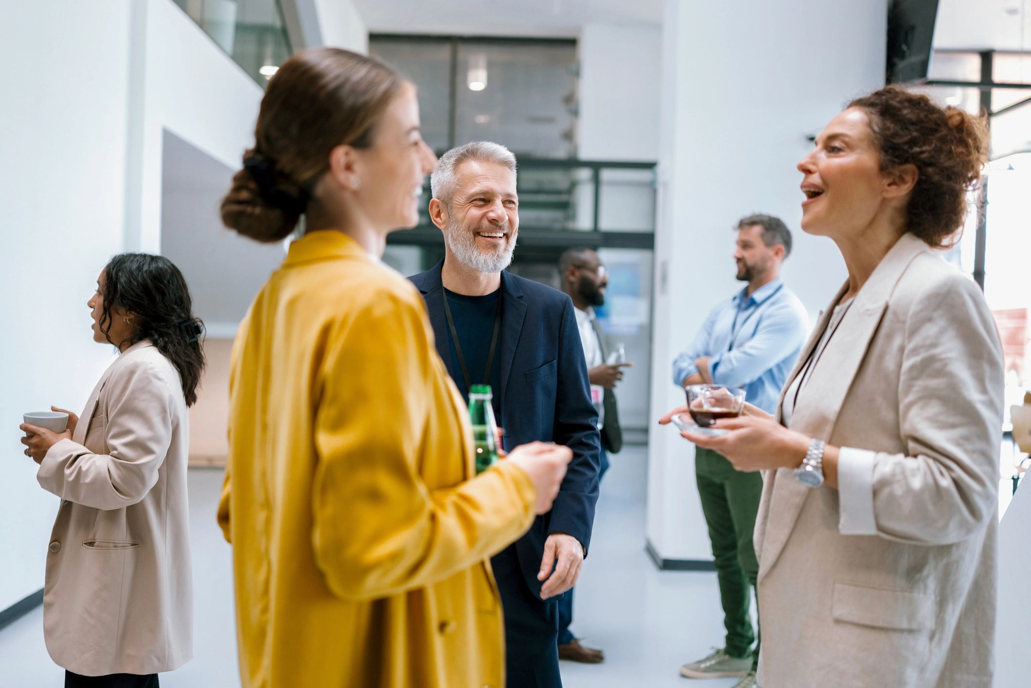 People in conversation during a meeting